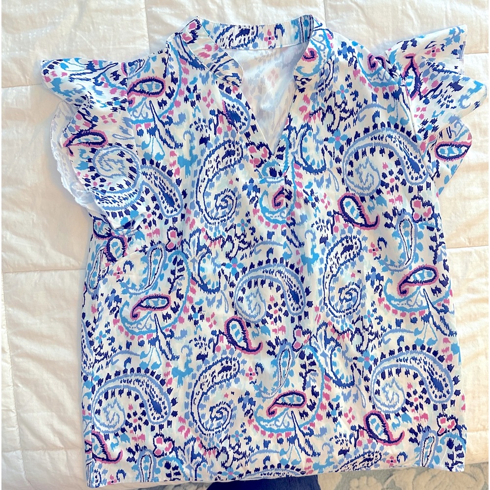 Multi colored blouse purchased from a boutique.